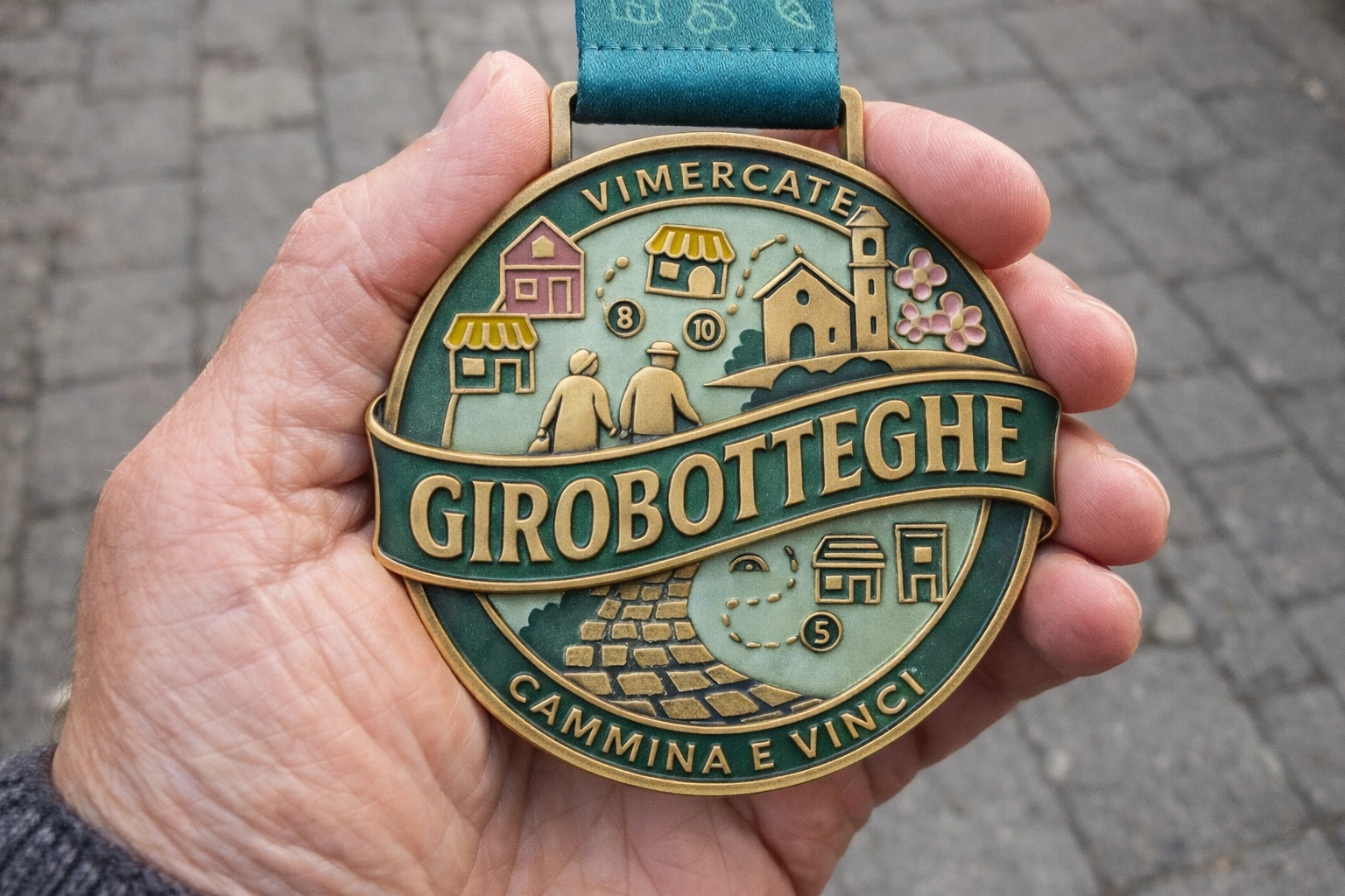La medaglia consegnata a chi completa il giro